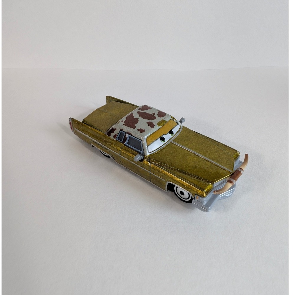Disney Pixar Cars Tex Dinoco Gold Cadillac Diecast Toy Car Longhorns Mattel